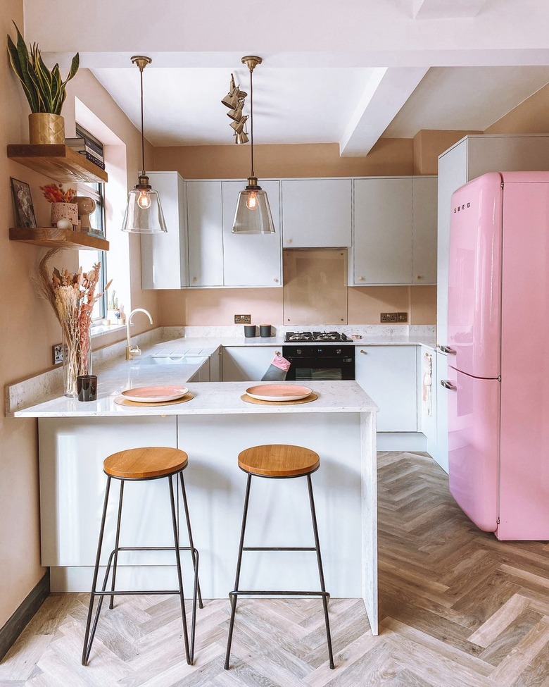 pink kitchen with retro pink refrigerator