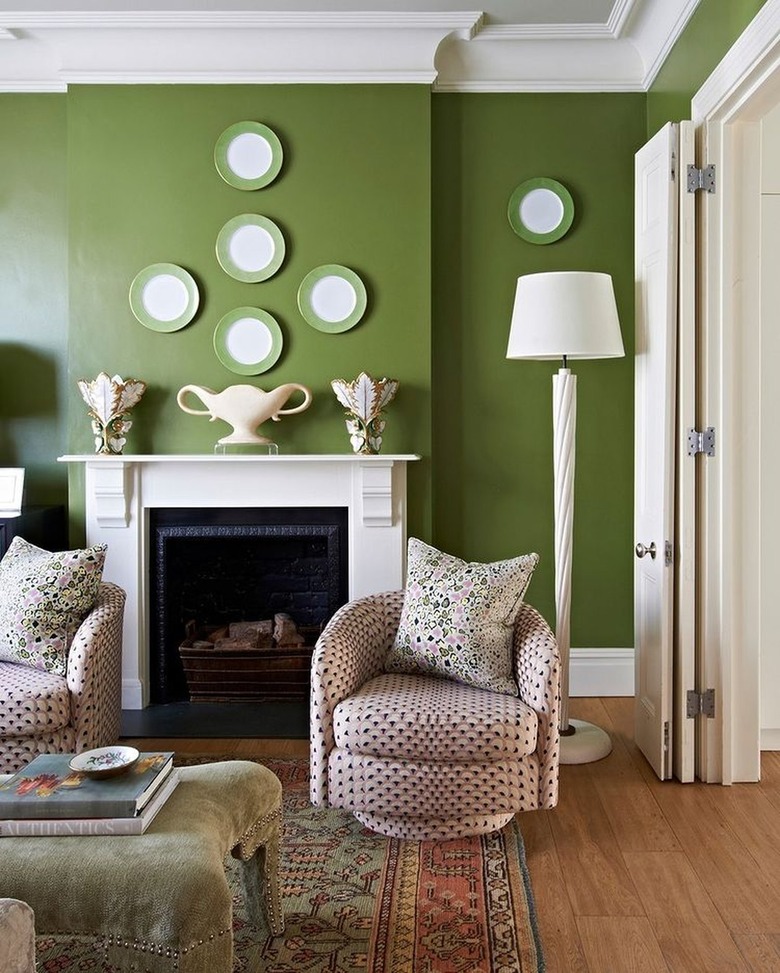 green and white plates on green wall