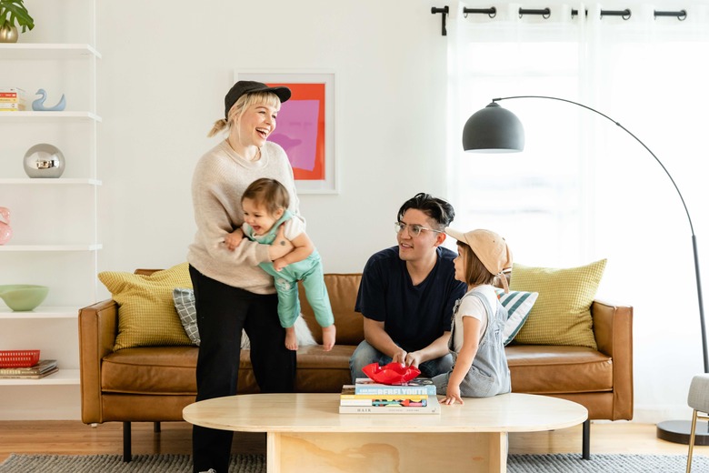 Bethany, Billie, Jorge and Zara in their bright living room.