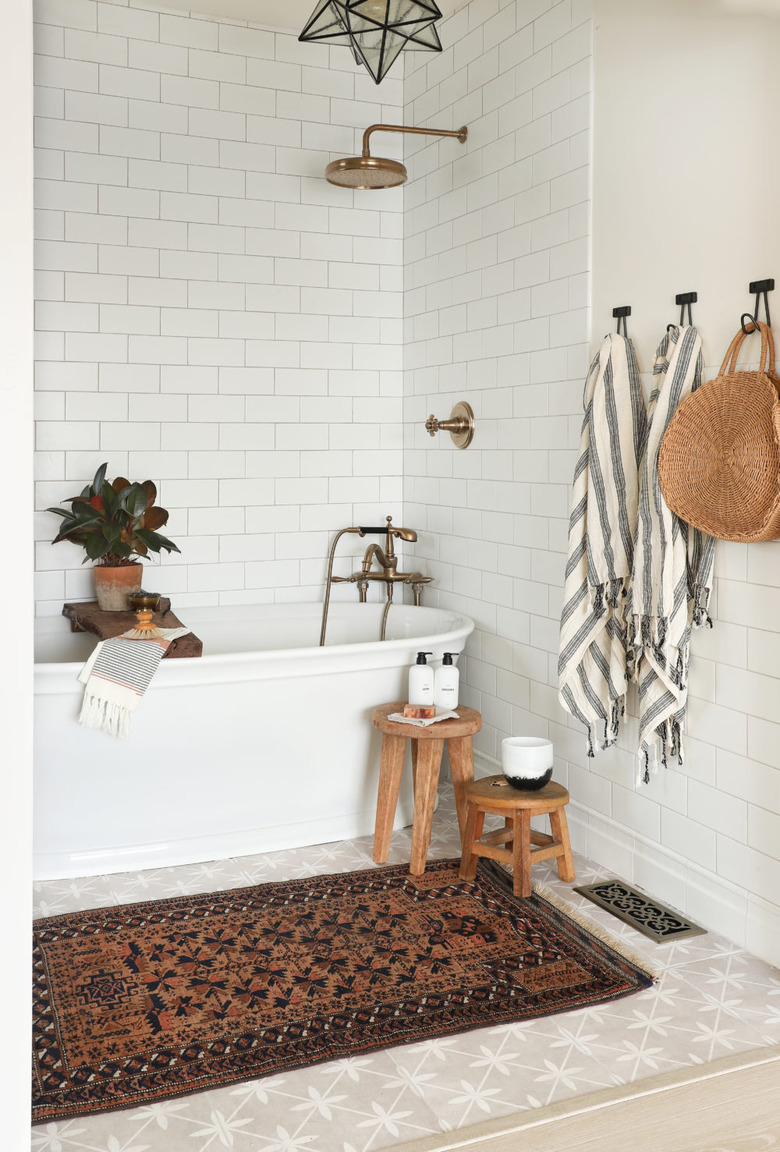 white bathroom with tub and shower combination