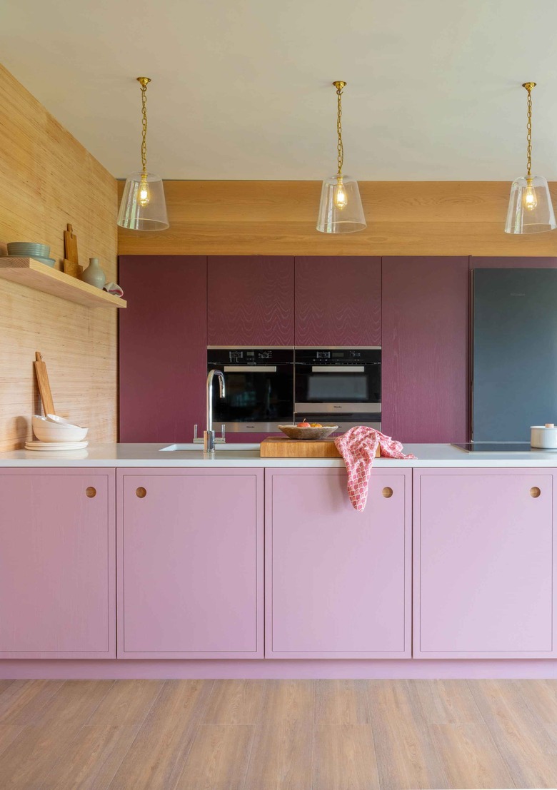 purple kitchen color idea with lilac kitchen cupboards with ply panelling