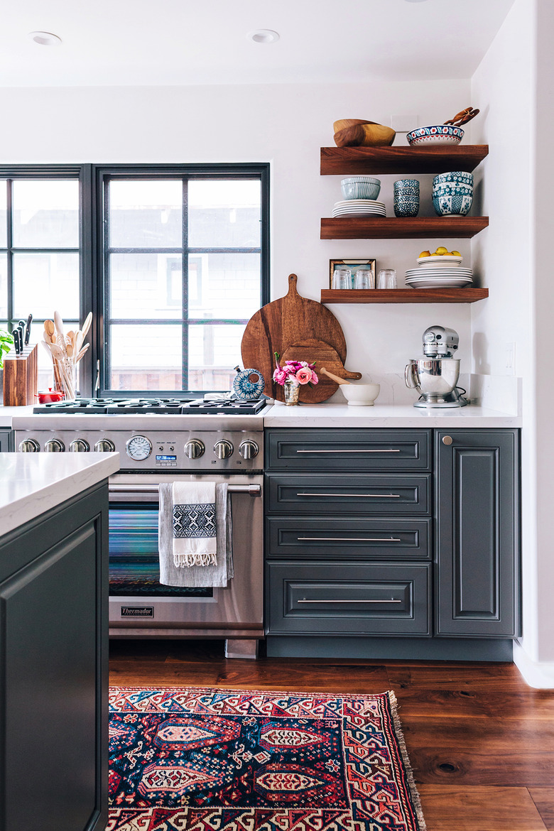 modern kitchen with dark wood cabinets