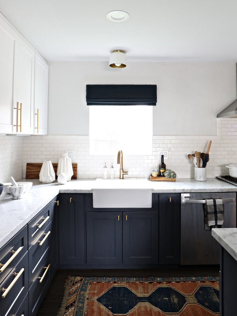 modern kitchen with dark blue wood cabinets