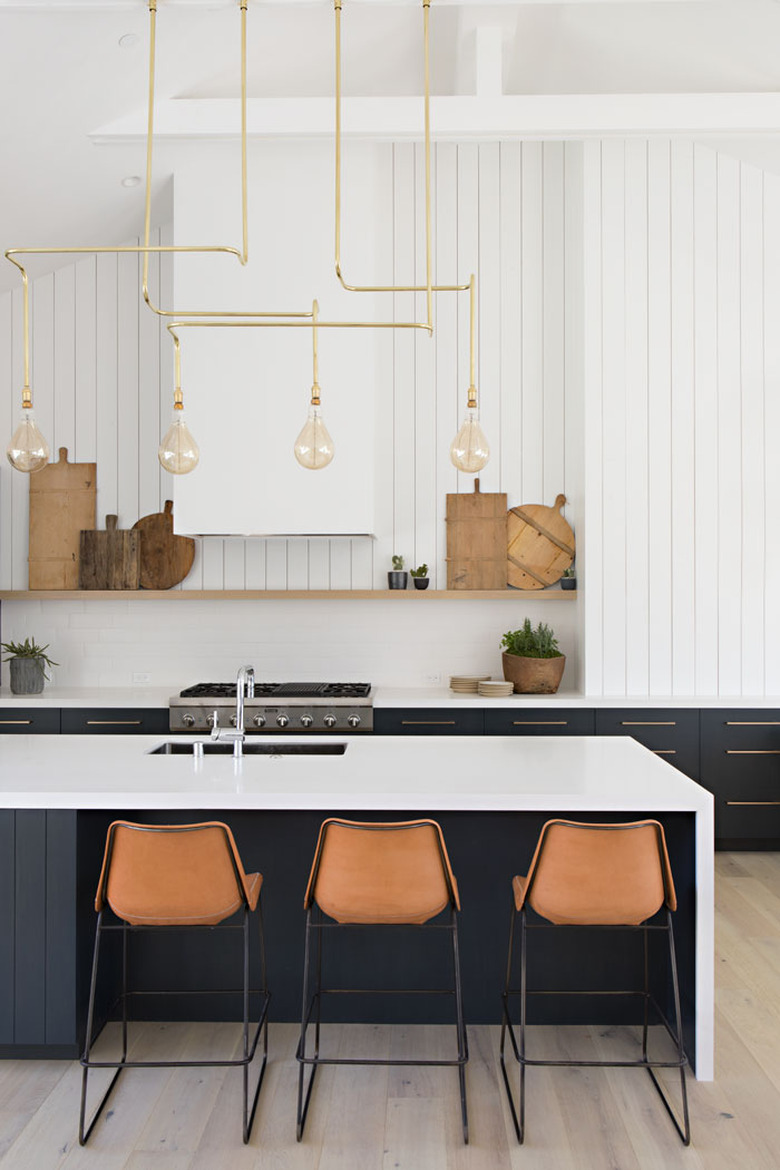 modern kitchen with dark wood cabinets