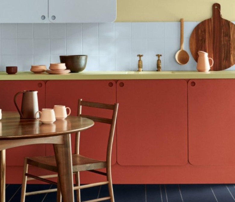 Red kitchen cabinets, table, chairs