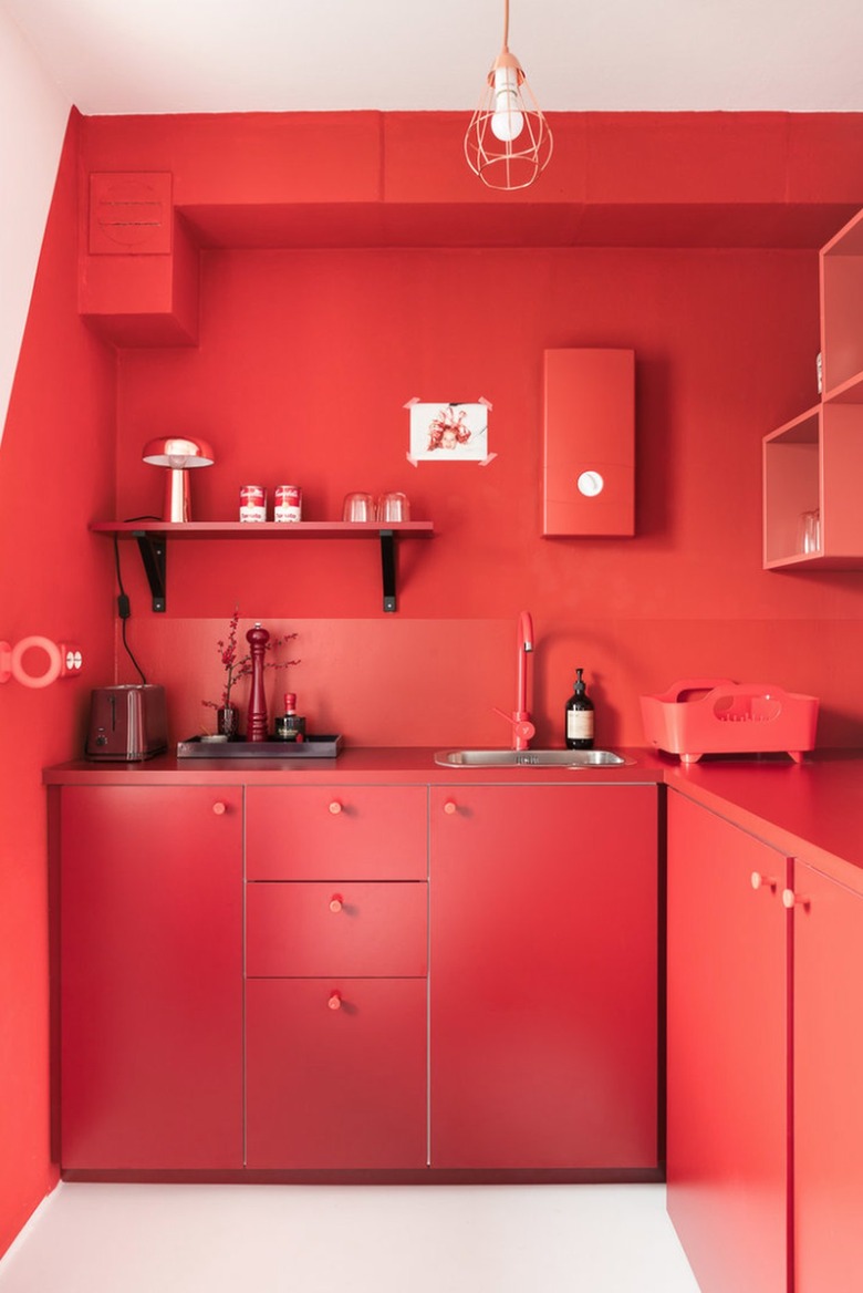 Red kitchen cabinets and walls