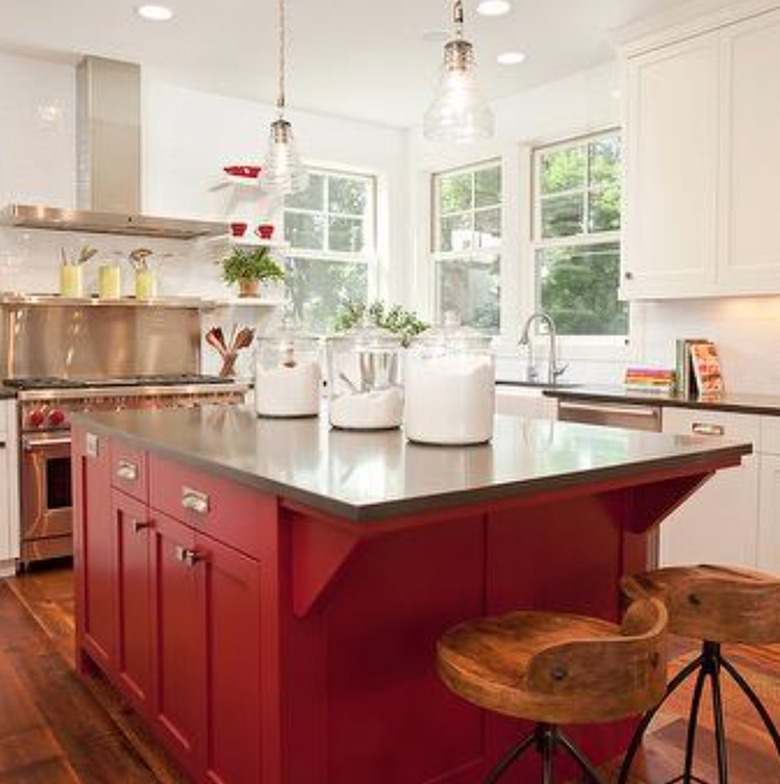 Kitchen with white cabinets and red cabinets