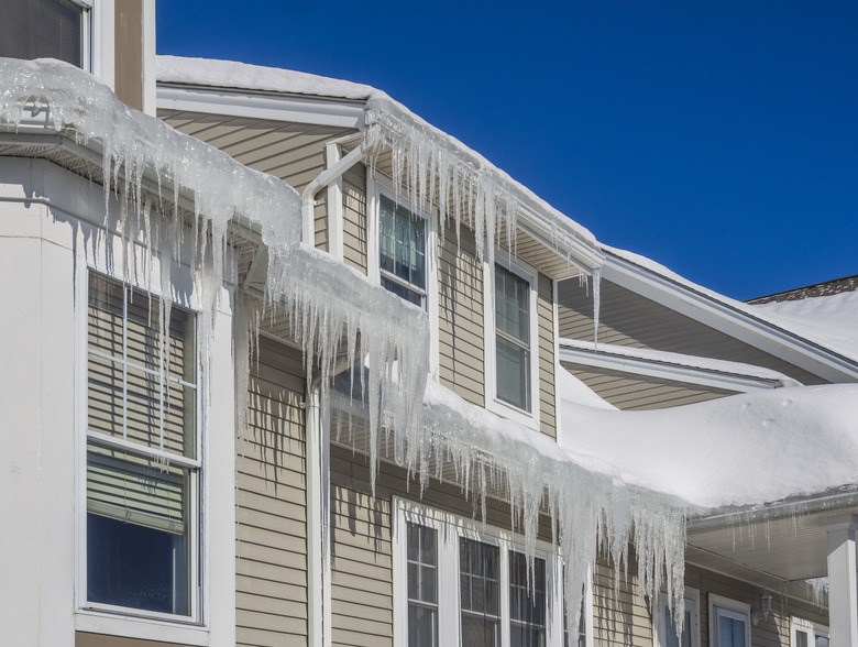 Ice dams and snow on roof and gutters