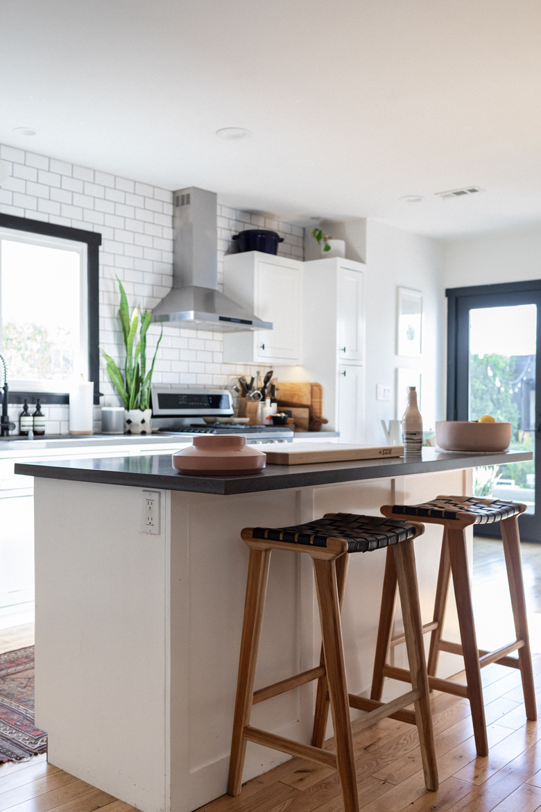 Rectangular kitchen island with barstool seating and protruding counter