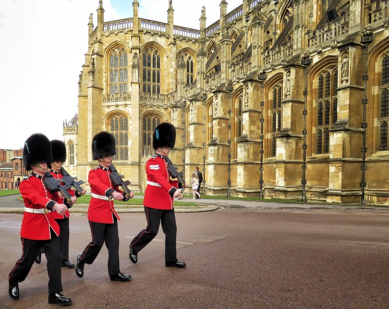 Royal guards marching in front of Buckingham Palace.