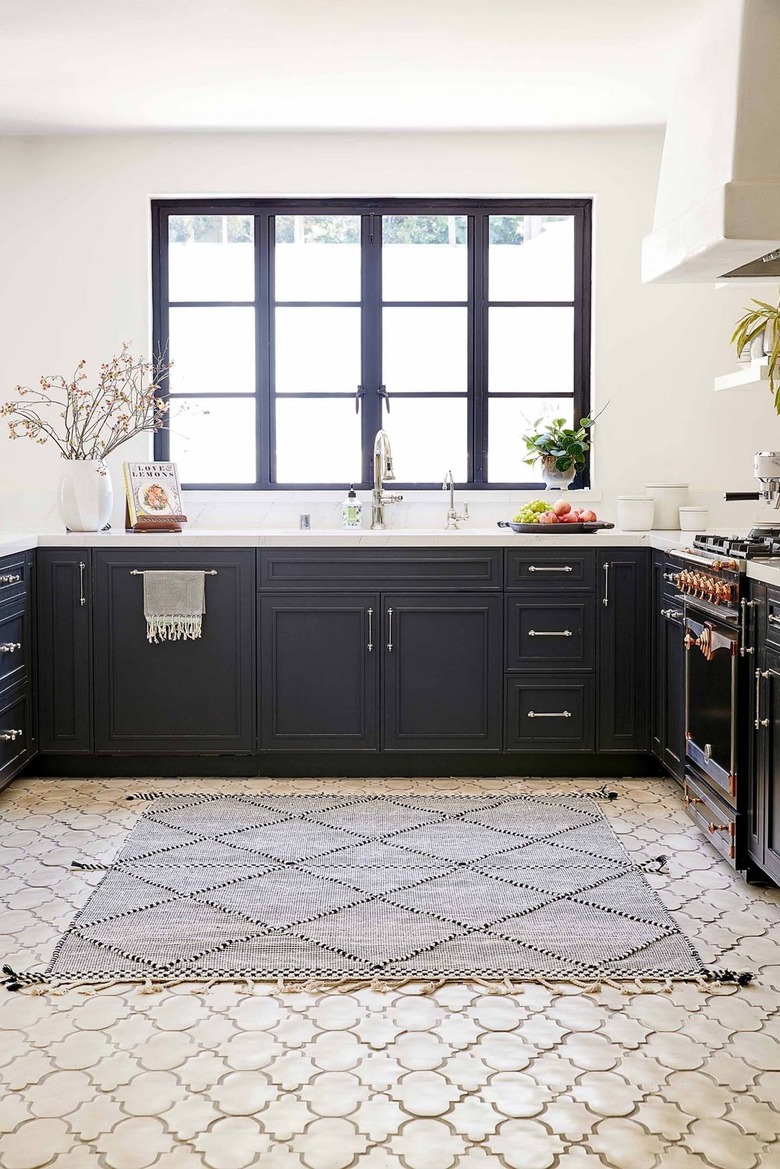 rug for kitchen floor with Moroccan tile and black cabinets