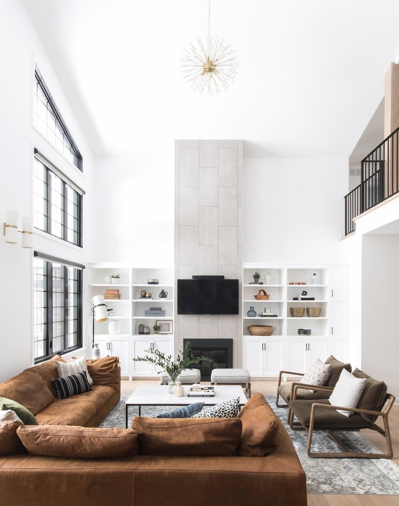 rustic family room ideas with brown couch and gold ceiling light