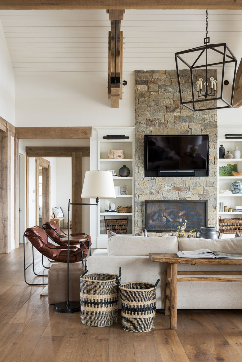 Living Room lighting idea in rustic space with wood beams