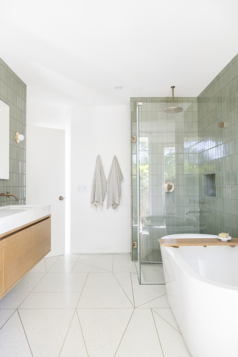 Contemporary bathroom with white floor tile and sage color shower tile