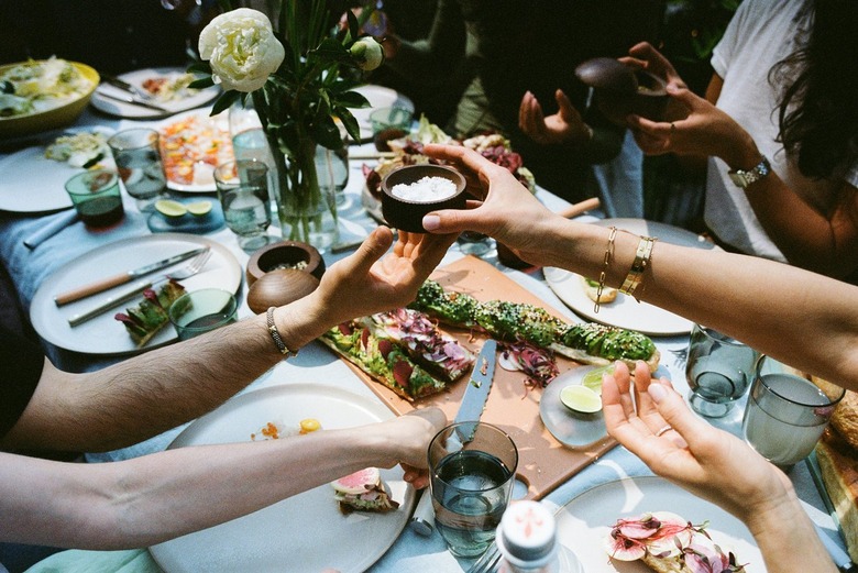 salt being passed at table