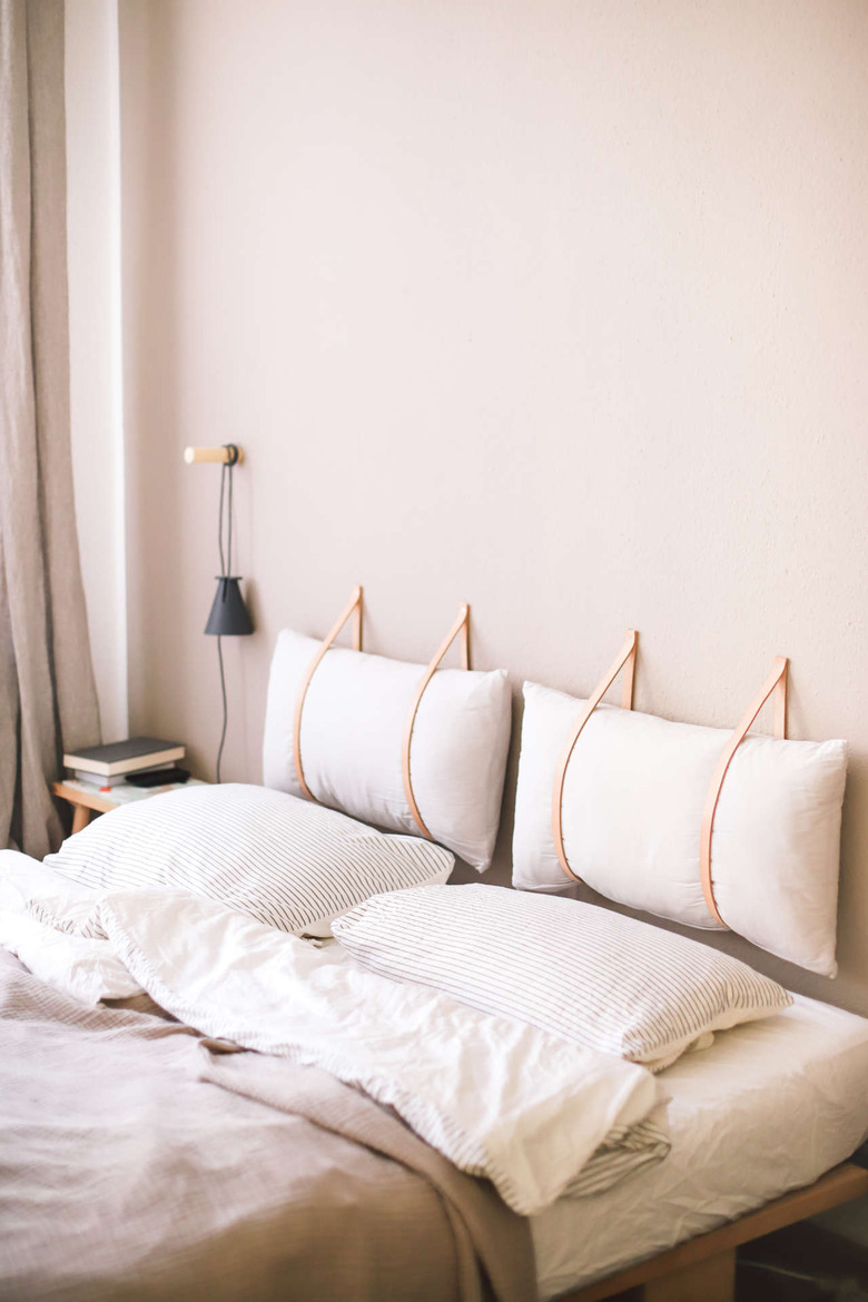 DIY Scandinavian headboard with leather straps