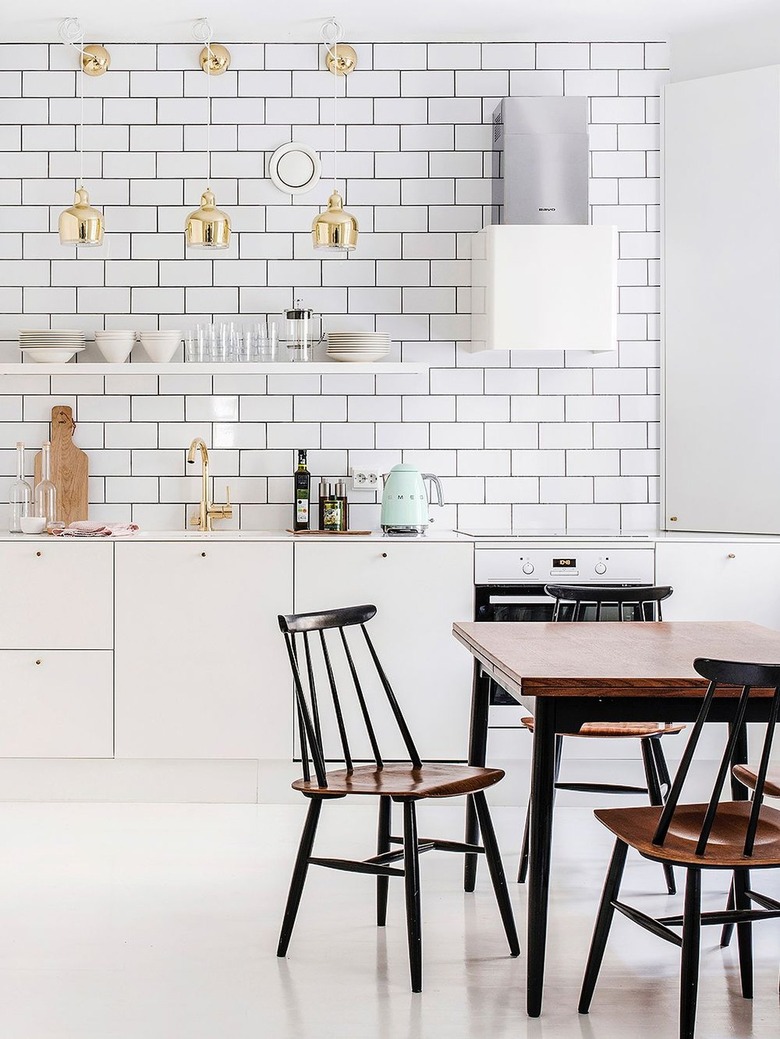 all white scandinavian kitchen with subway tile backsplash