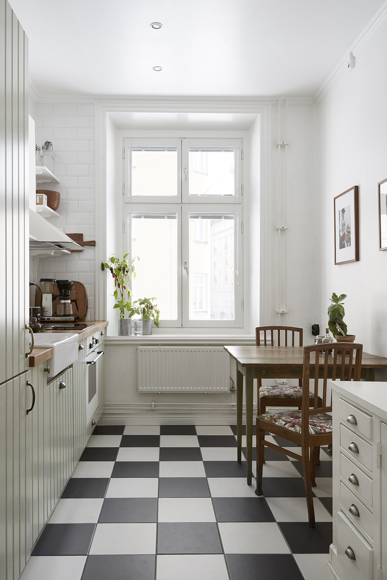 scandinavian kitchen with checkered floor tile