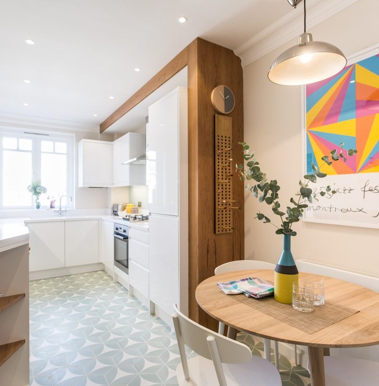 Scandinavian kitchen floor tile with pattern and white cabinets