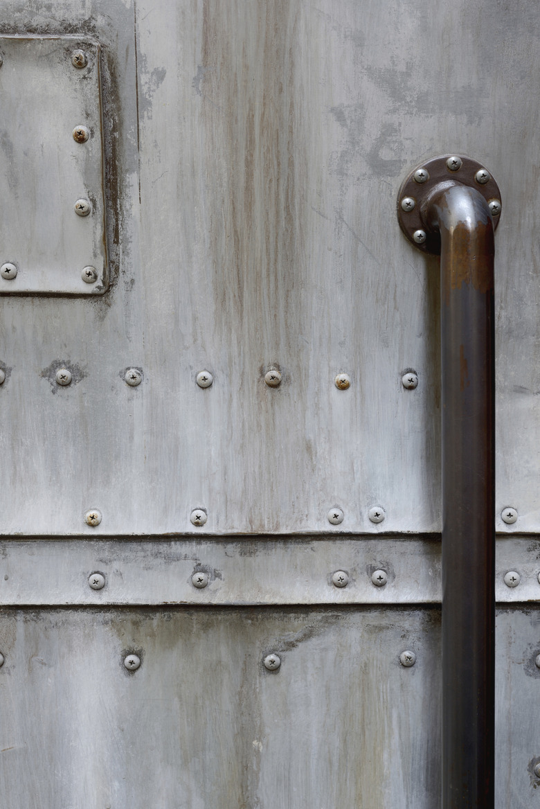 grunge metal door with door handle