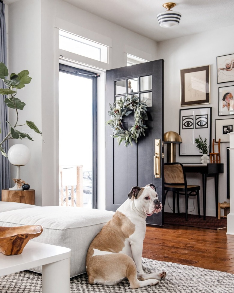 semi-flush mount light in entryway and living room