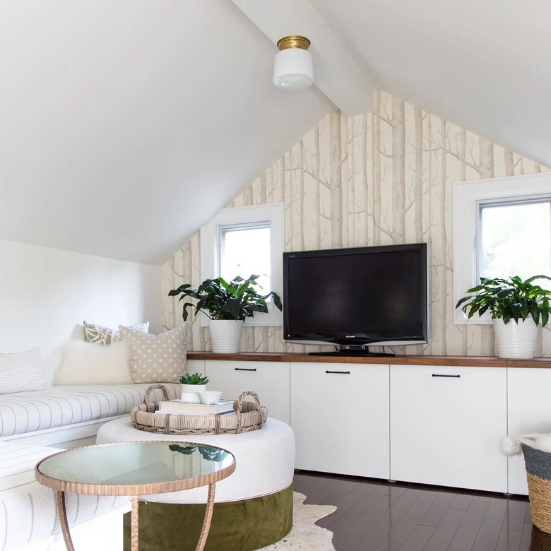 attic living room with semi-flush mount light fixture