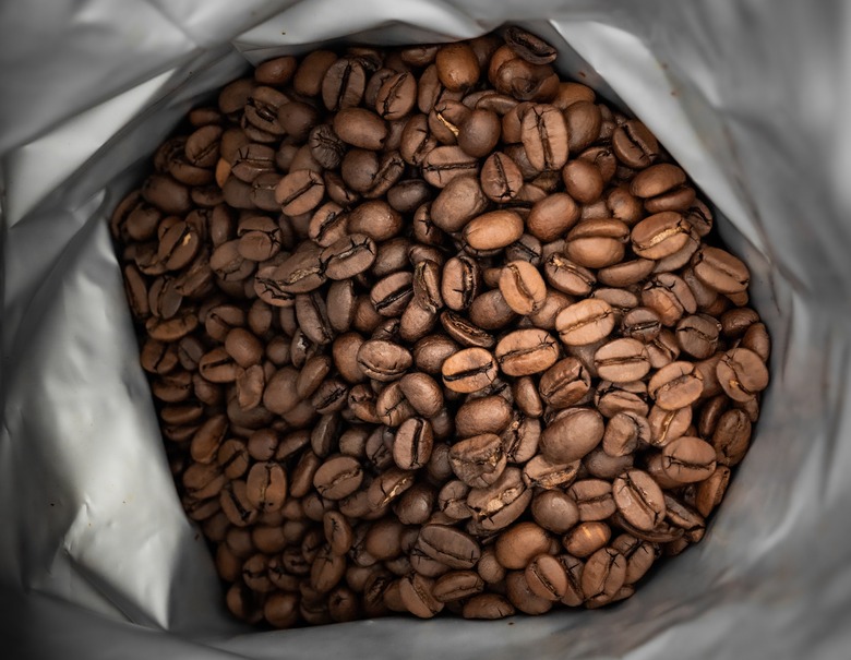 brown coffee beans in foil bag