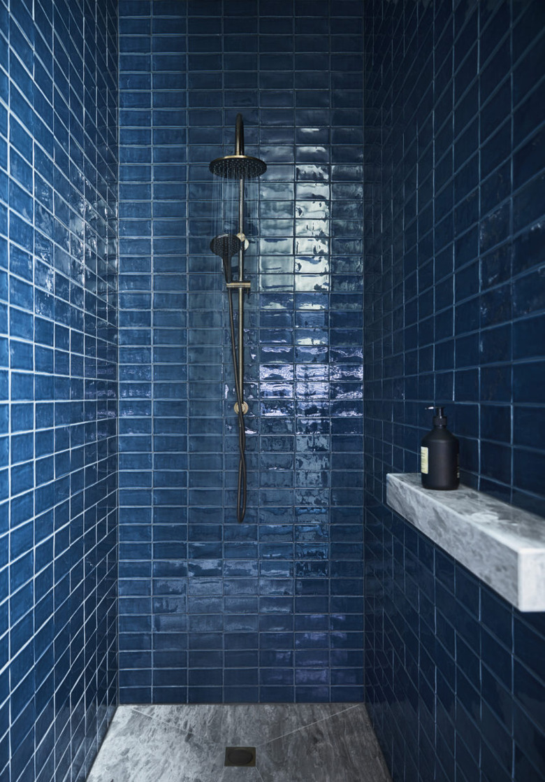 blue shower tile ideas with marble shower ledge