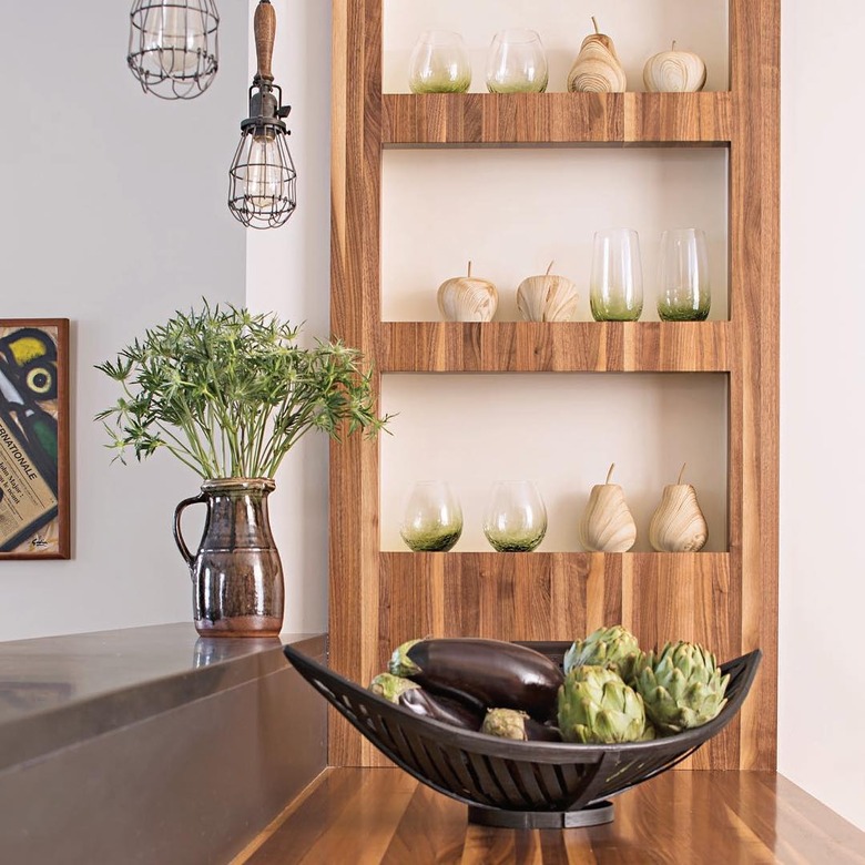 Modern kitchen with natural wood finishes and slate countertops