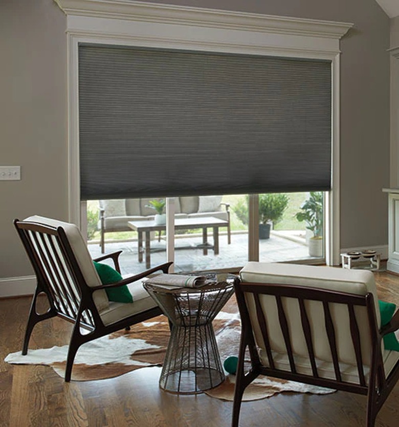 A cellular shade over sliding glass doors