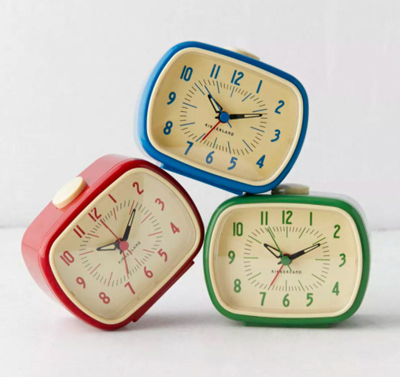 3 analog retro clocks stacked together