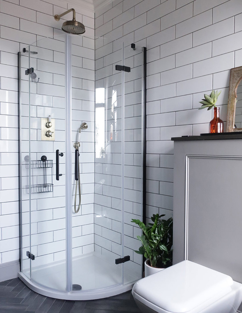 small shower idea in the corder with glass enclosure and black fixtures