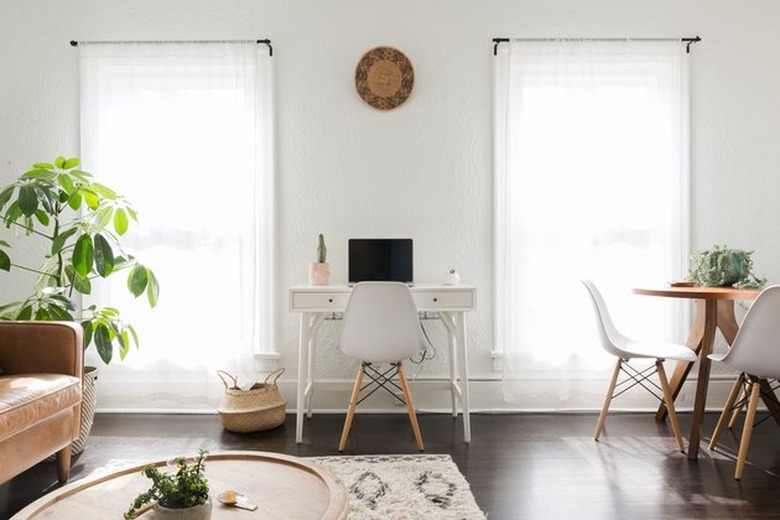 living room space with desk and dining area