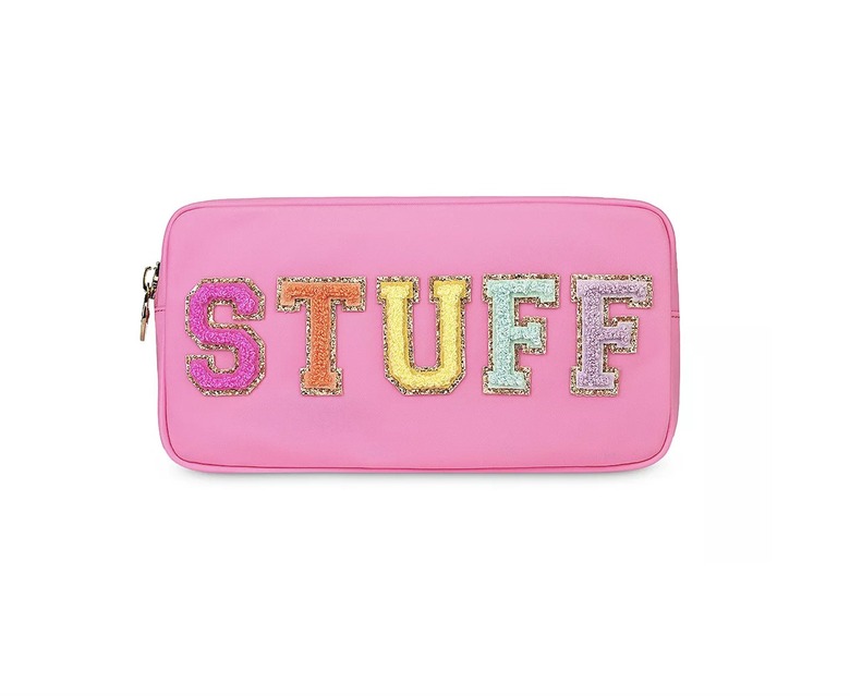 pink pouch with stuff written