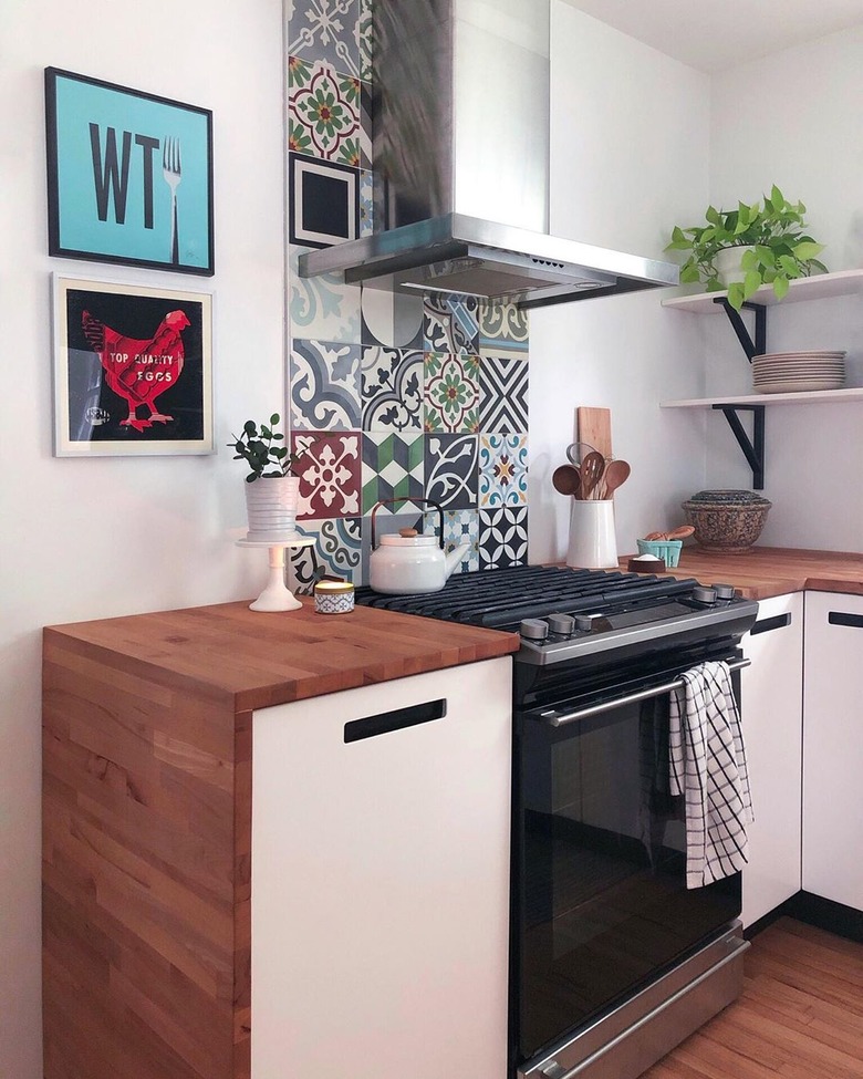 mixed cement tile stove backsplash butcher block waterfall counter