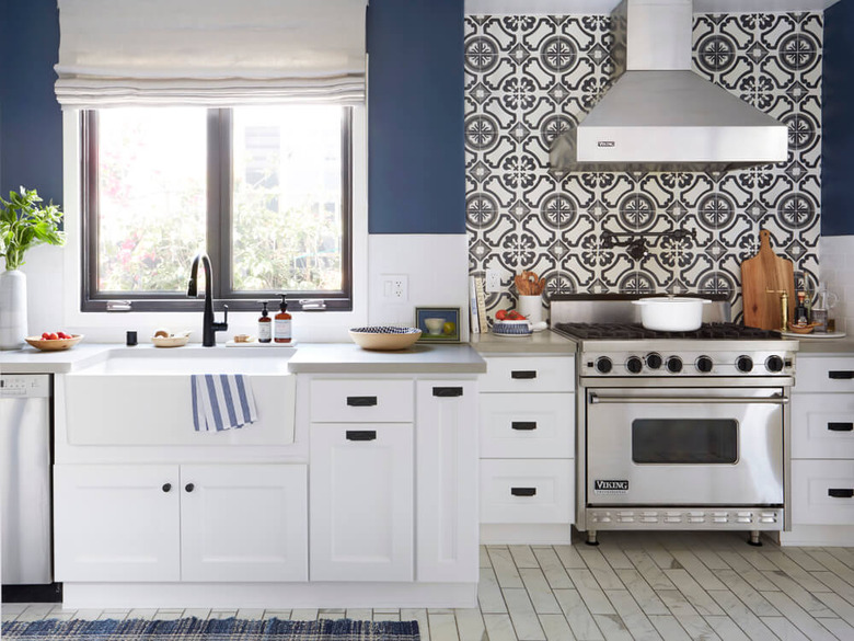 patterned cement tile backsplash in traditional blue and white kitchen