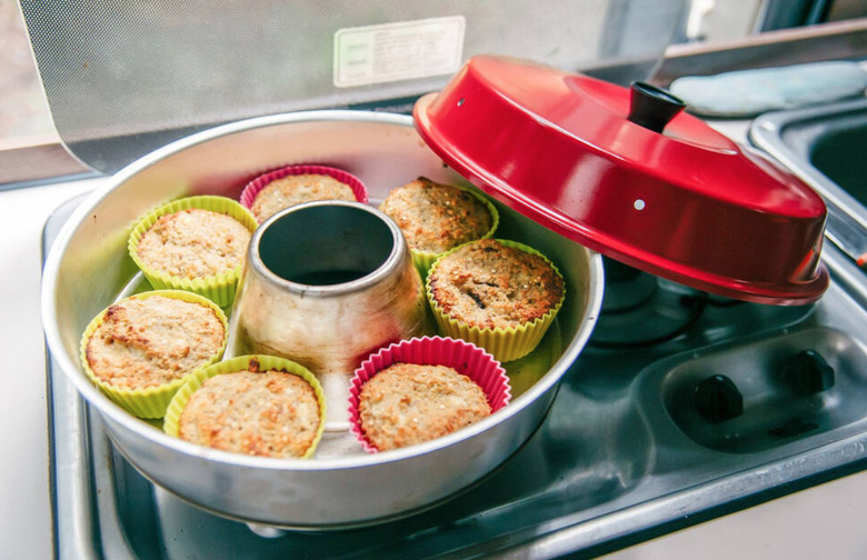 Stove top oven with muffins inside. small stove size