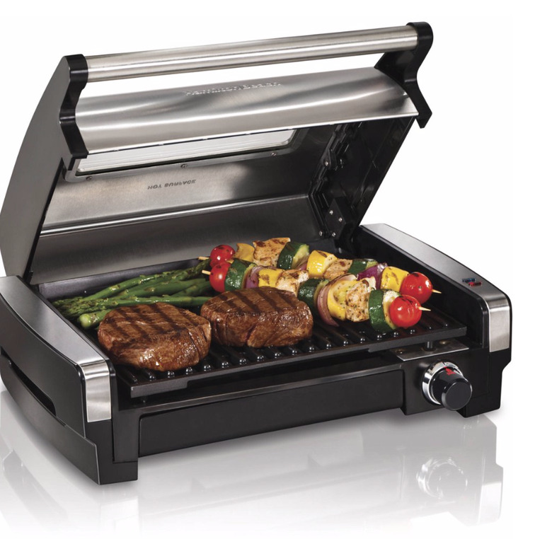 Electric grill with steaks, veggies. small stove size ideas