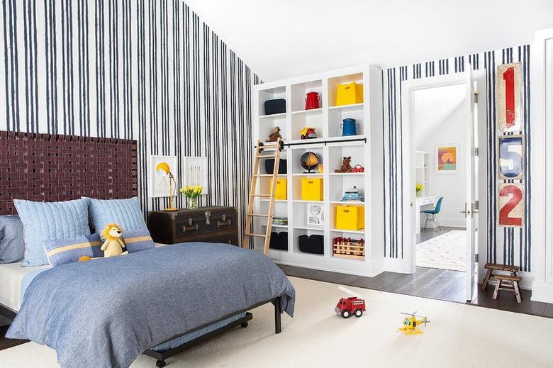 Stuffed Animal Storage in Boy's bedroom with cubbies and organized bins designed by Chango & Co.