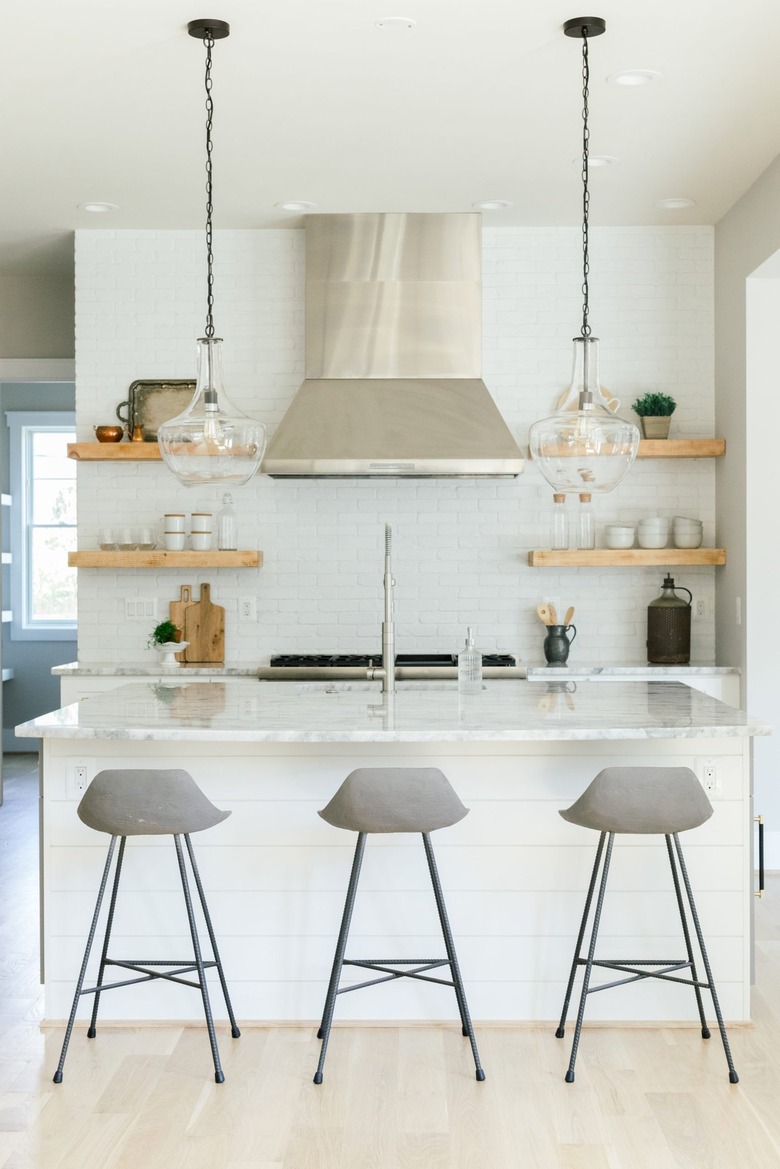 modern kitchen with open shelves and industrial lighting