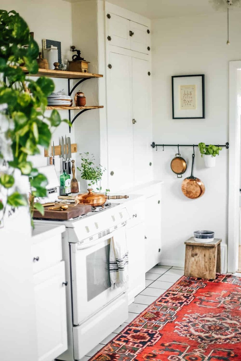 small kitchen with area rug on floor