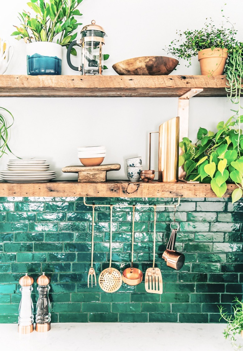 green subway tile backsplash in bohemian kitchen