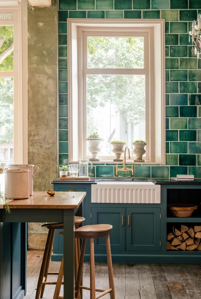 green subway tile in traditional kitchen with window