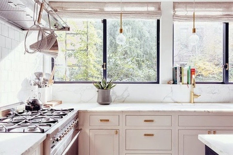 white subway tile backsplash with white marble backsplash