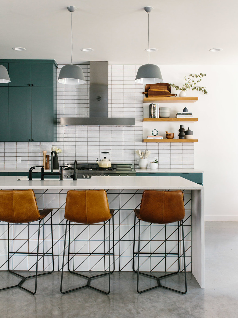 modern kitchen with subway tile backsplash and linear details