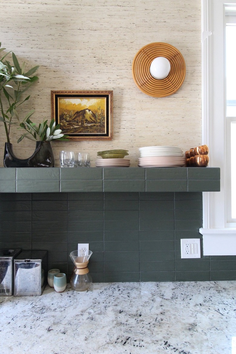 dark green subway tile backsplash with modern decor