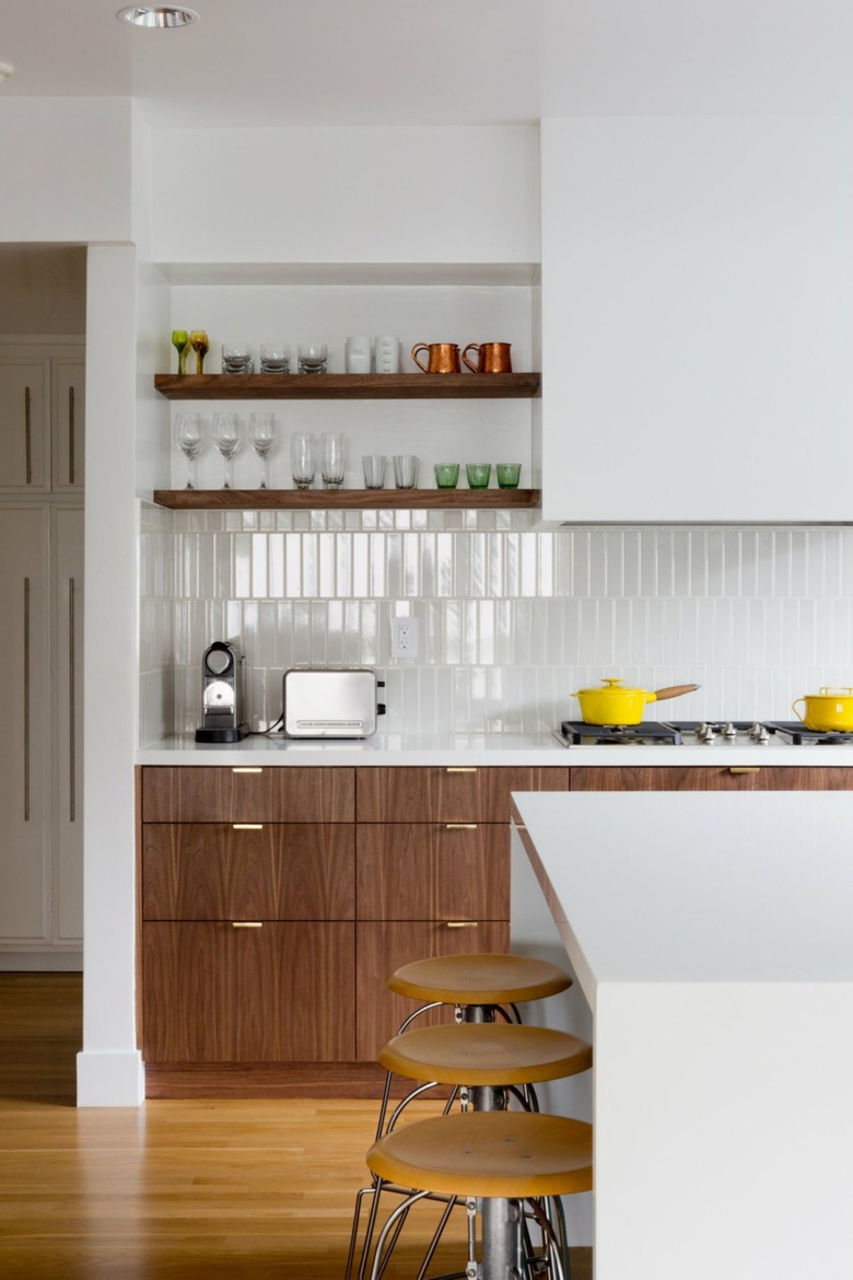 high gloss subway tile kitchen splashback with walnut details