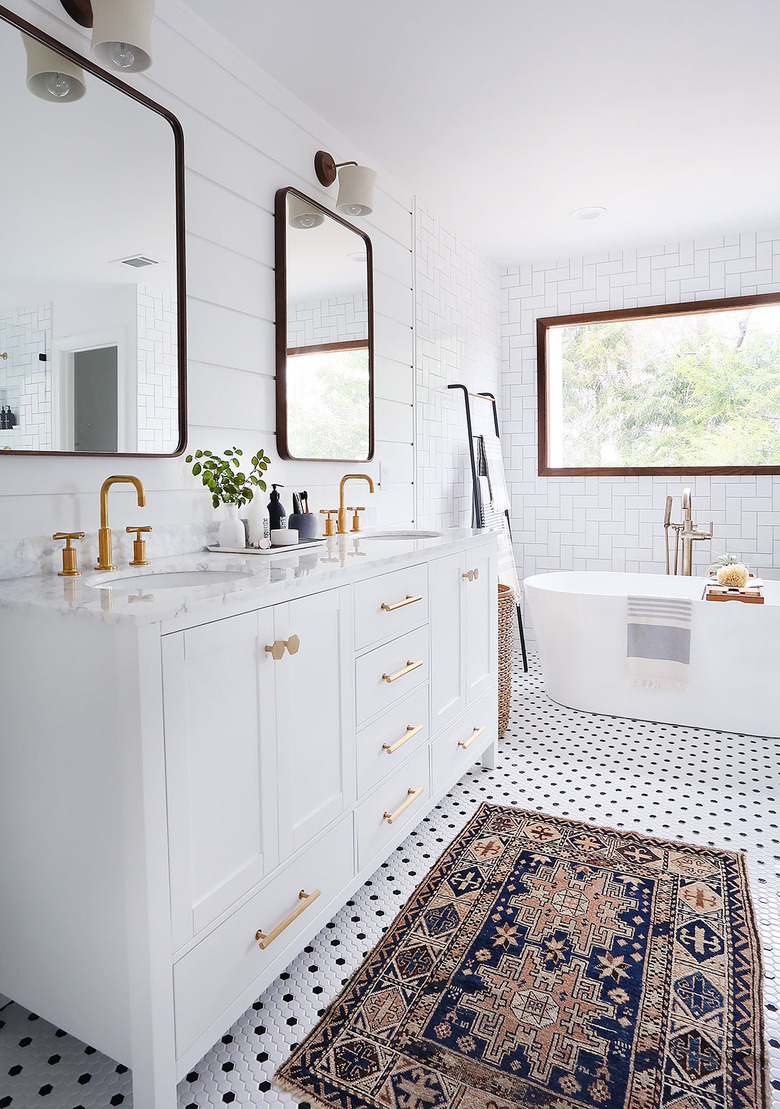 bathroom mirror idea with white bathroom with panelled walls and walnut mirrors