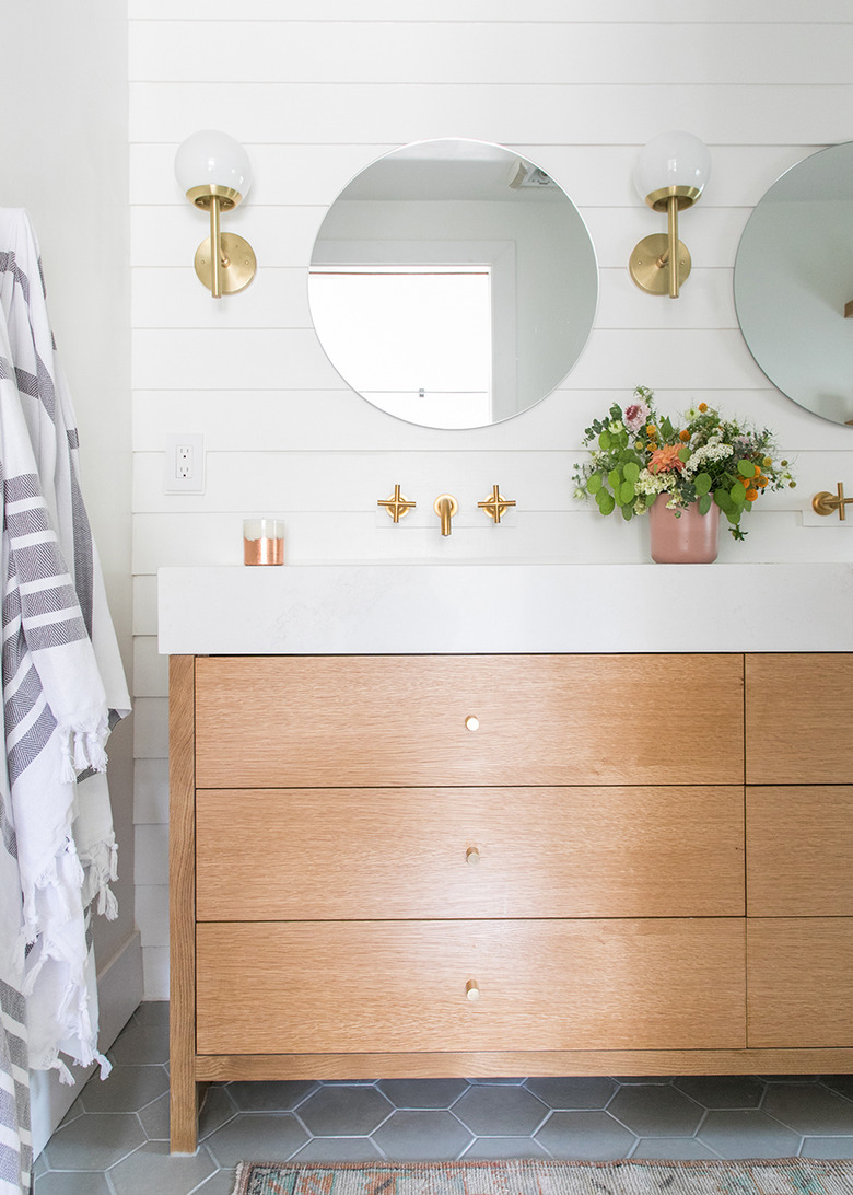 bathroom mirror idea with white bathroom with wooden vanity and frameless mirror