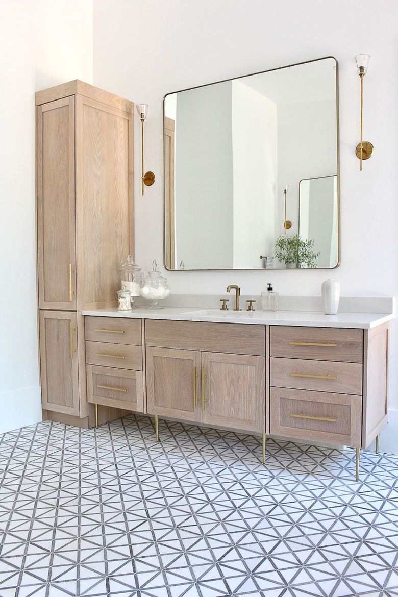 bathroom mirror idea with huge accent mirror in neutral bathroom